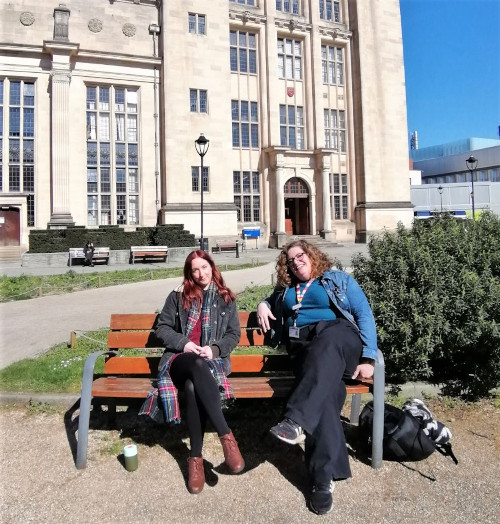 Rosey and Victoria sitting on a bench.